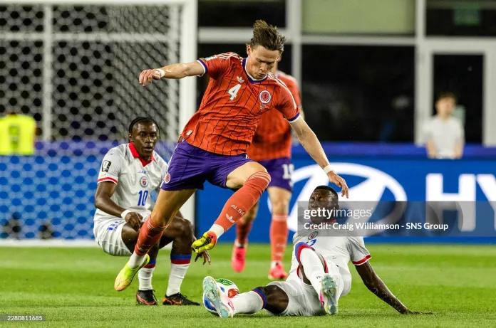 Scotland's Scott McTominay and Danley Jean Jacques of Haiti in action during a 2026 FIFA World Cup Group C match between Haiti and Scotland at the Boston Stadium, on June 13, 2026, in Foxborough, United States. (Photo by Craig Williamson/SNS Group via Getty Images)