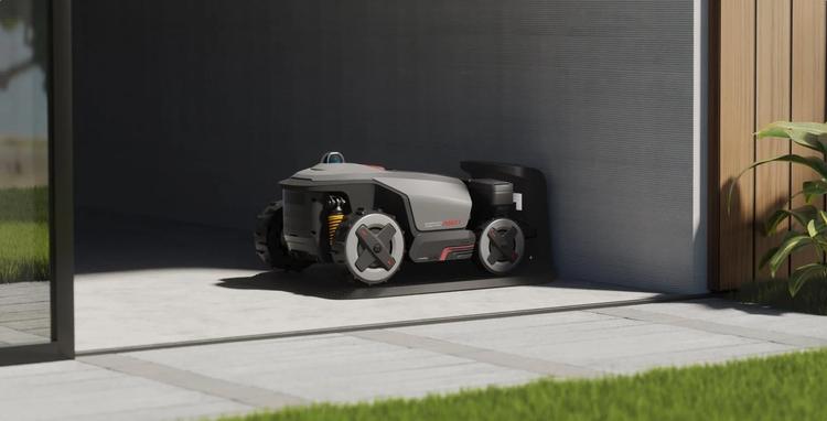 the Roborock RockMow Z1 on its charging base