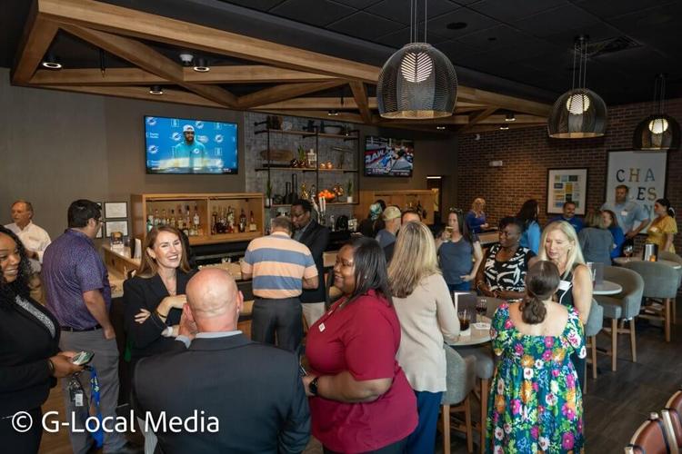 Wide shot photo of attendees of the September Mixer business event presented by the North Charleston Chamber of Commerce