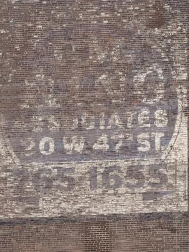 An old logo on the building taken from 30x zoom