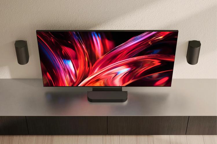 Sony Bravia 9 II TV on TV stand with Bravia Theater Trio speakers