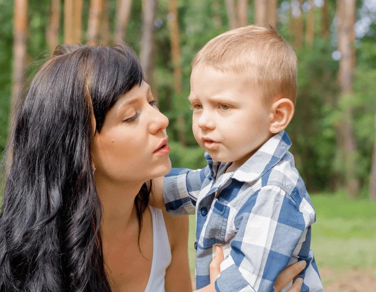 Mother comforting her toddler during a smooth morning school drop-off.