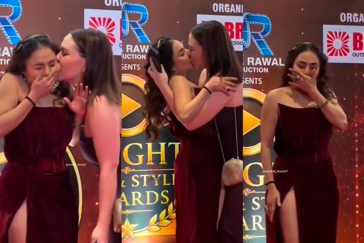 Atriz indiana é beijada à força por fã durante evento