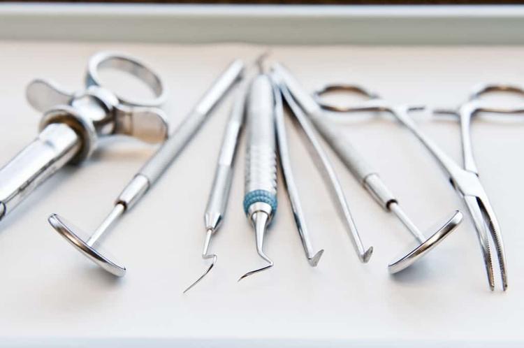 Closeup of surgical instruments and tools. Sterile processing education involves learning about surgical tools.