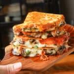 sliced and stacked quesadillas on cutting board