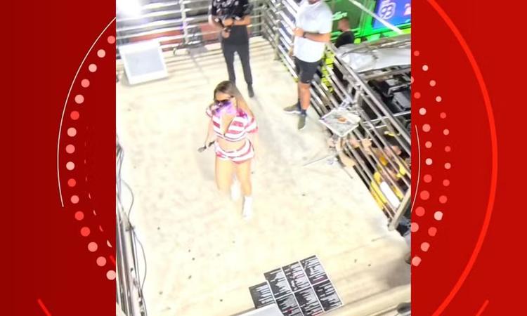 VÍDEO: Alinne Rosa é atingida no rosto com copo durante desfile no Fortal