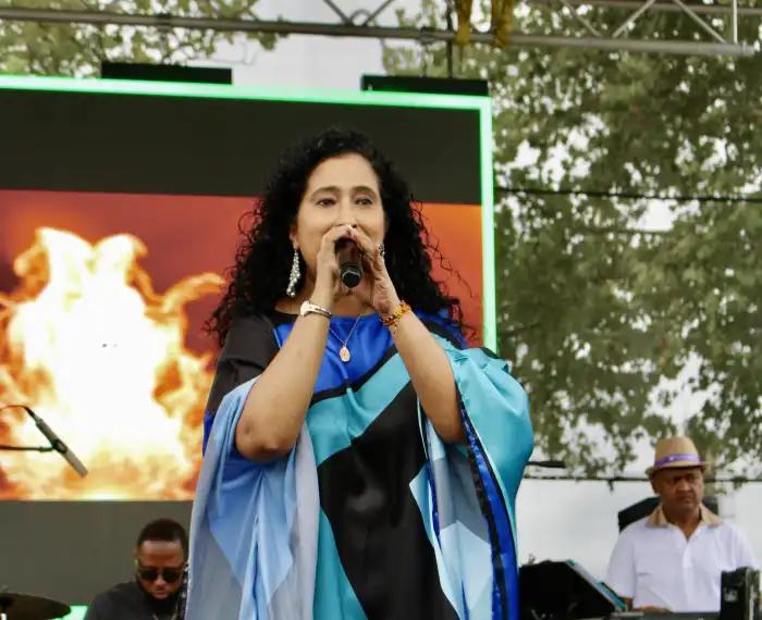 Lead vocalist Geeta Bisram put on a dynamic performance with the Angels Caribbean Band on Aug. 16, during a crowded-pleasing 9th Queens International Food and Music Festival at Smokey Oval Park in South Richmond Hill.