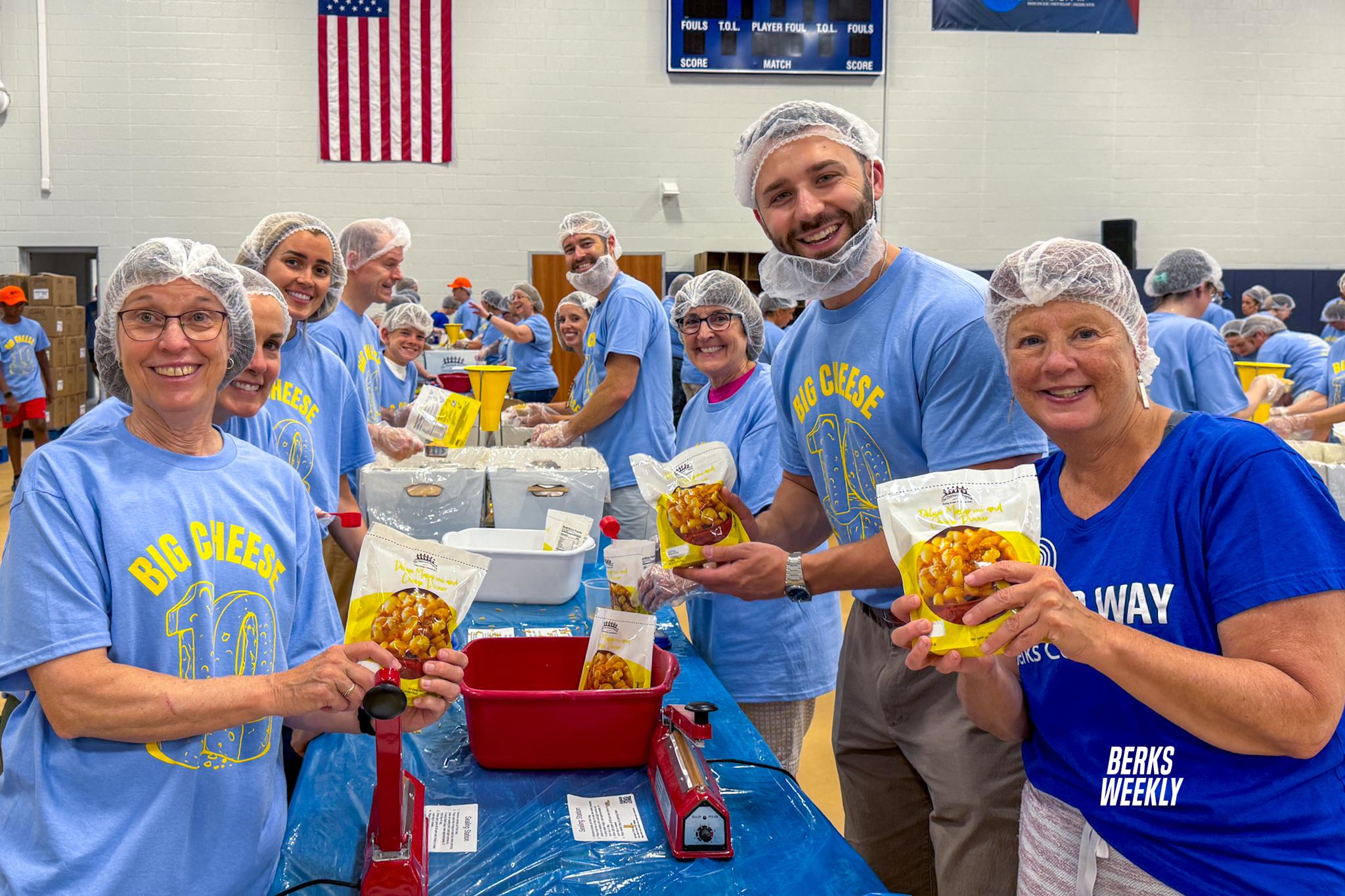 United Way volunteers pack 250K meals during 10th annual Big Cheese event
