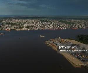 ExxonMobil is set to recover its entire $55 billion Guyana investment by mid-2026 as GDP grows 16.2%. The median Guyanese worker earns just $239 a month.