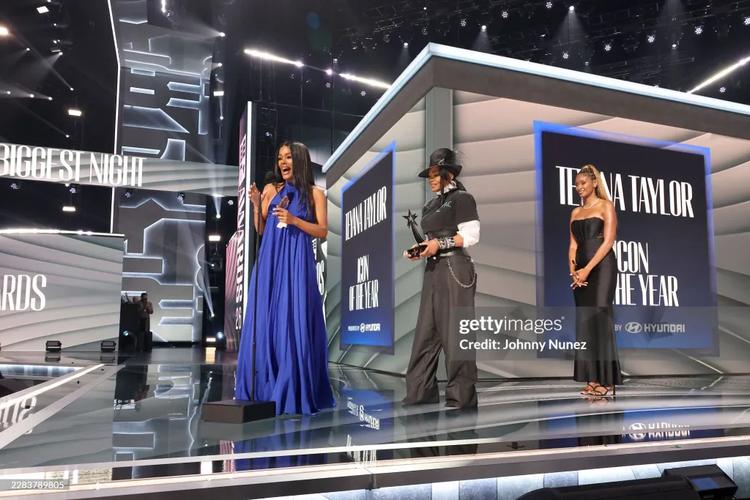 (L-R) Teyana Taylor accepts the Icon of the Year award from Janet Jackson onstage during the BET Awards 2026 at Peacock Theater on June 28, 2026 in Los Angeles, California. 