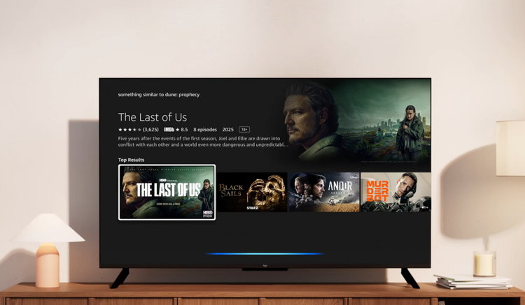Amazon Ember TV on TV stand between two lamps