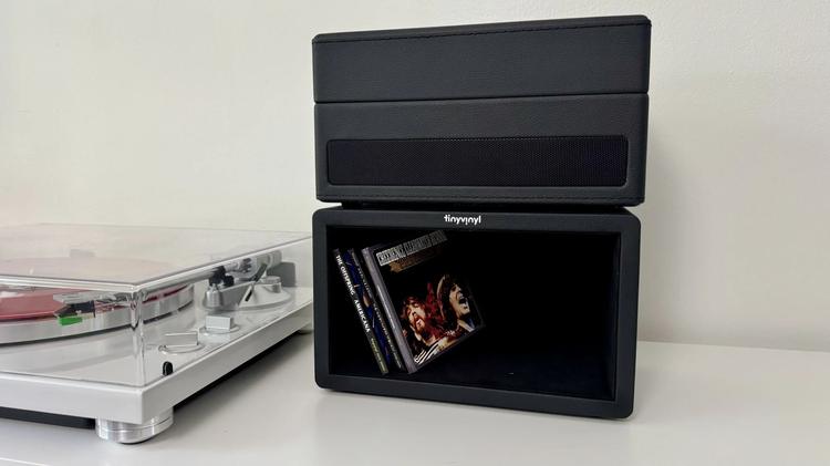 the tiny vinyl player on top of the tiny vinyl crate