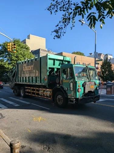 A garbage truck moving at full speed caught by magic capture