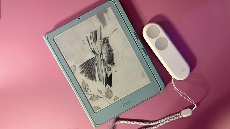 The Kindle Click next to a Kindle Paperwhite Signature Edition