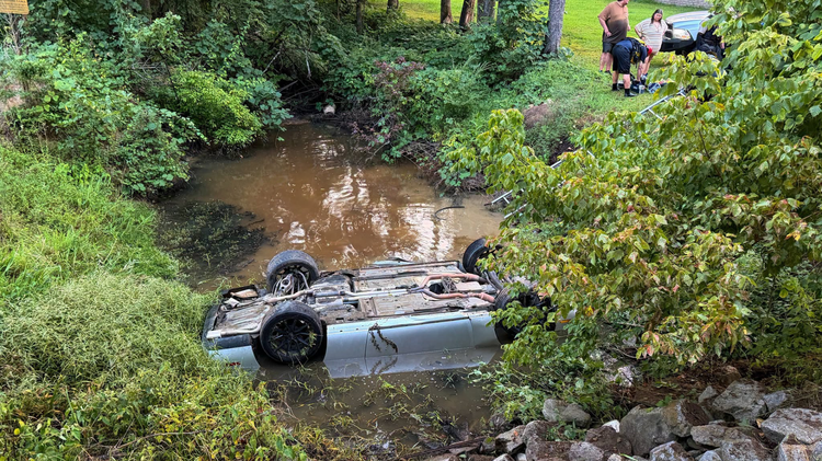 Lafayette County driver rescued from overturned, submerged vehicle