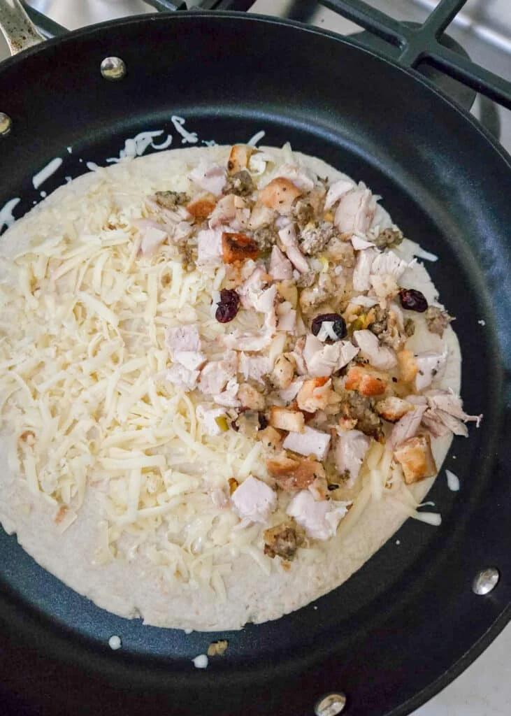 ingredients on tortilla for quesadilla