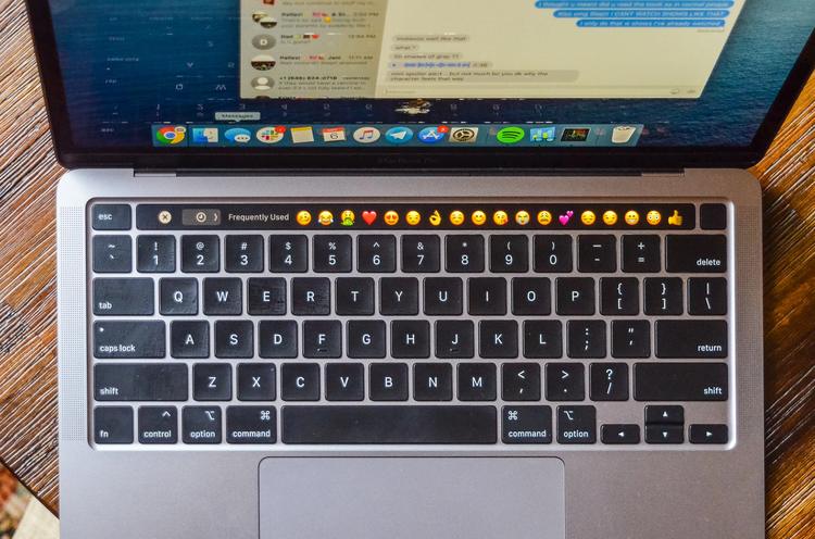 a macbook pro with a touch bar