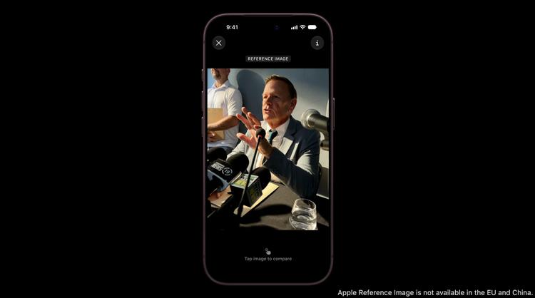 man having his photo taken from the perspective of the iphone camera