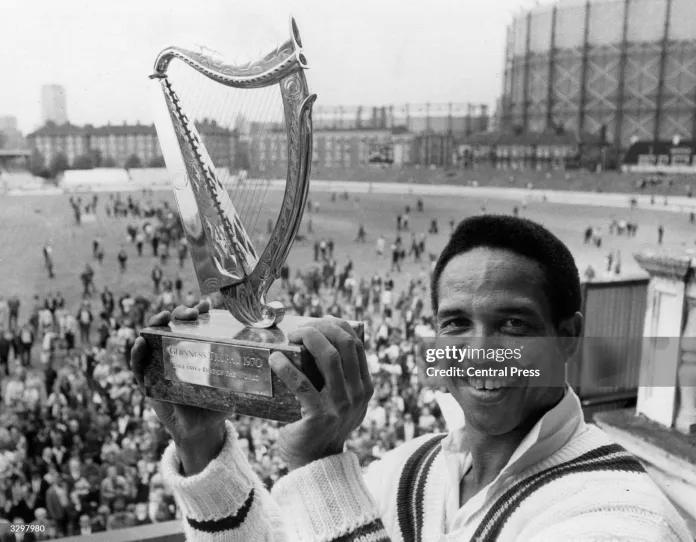 The captain of the Rest of the World Cricket team Garry Sobers with the Guinness Trophy, after his team beat England at the Final Test match held at the Oval.  