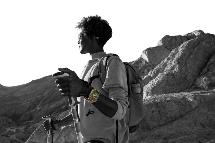 a hiker wearing the apple watch ultra 4