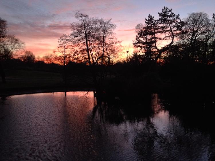 Picturesque Cannon Hill Park at sunset. 