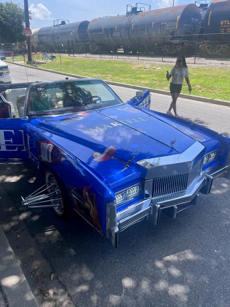 A blue police car with 
