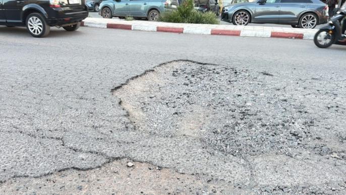 بسبب الحفر..شوارع بوعكاز بمراكش تتحول إلى نقط سوداء + صور