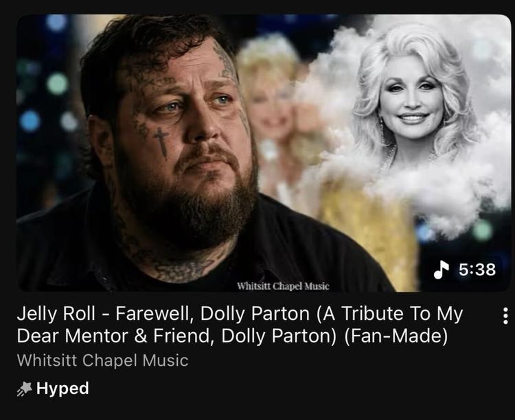 jelly roll looking wistfully at a black and white image of dolly parton in clouds