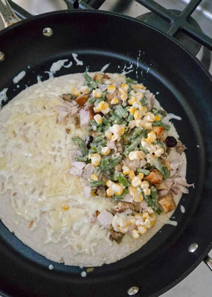 ingredients on tortilla for quesadilla