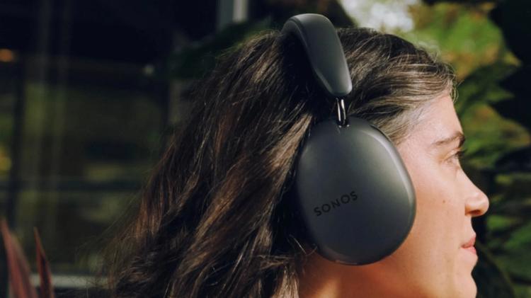A person wearing the Sonos Ace Ultra