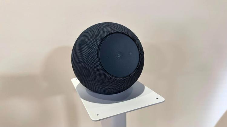 black Echo Studio speaker sitting on a platform