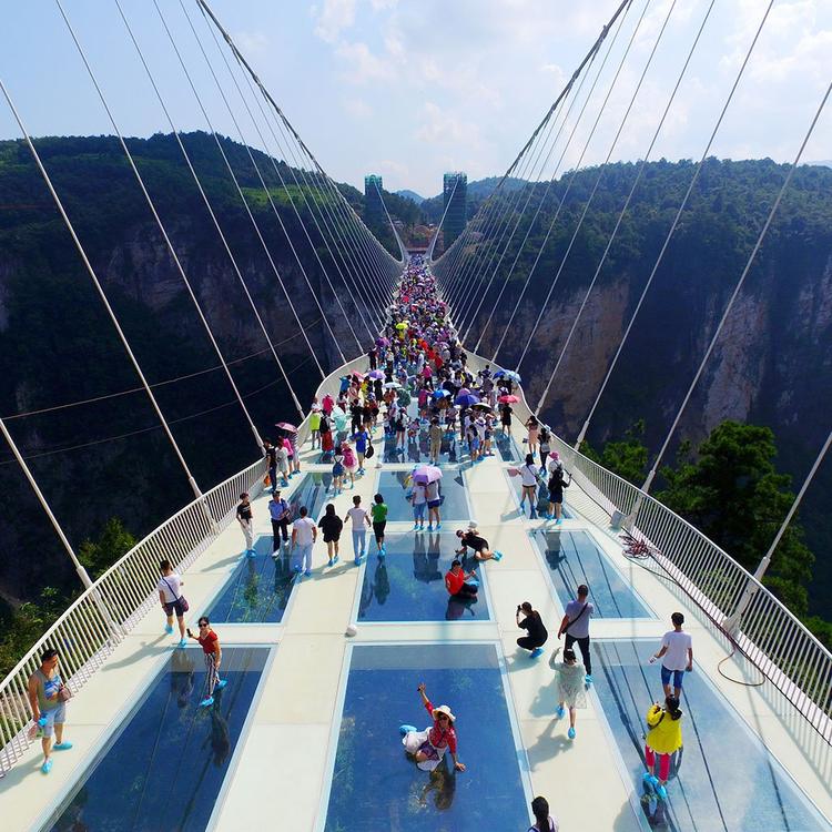 Zhangjiajie Grand Canyon's Glass-bottom Bridge Opens To Tourists