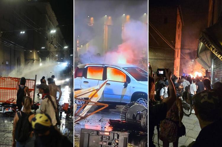 Oltre 60 feriti tra le forze dell'ordine, caos e auto bruciate. Ecco il bilancio della caccia all'agente dopo la manifestazione Pd