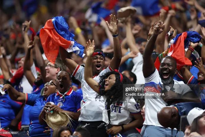 Fans of Haiti celebrate the team's first goal during the FIFA World Cup 2026 Group C match between Morocco and Haiti at Atlanta Stadium on June 24, 2026 in Atlanta, Georgia. 