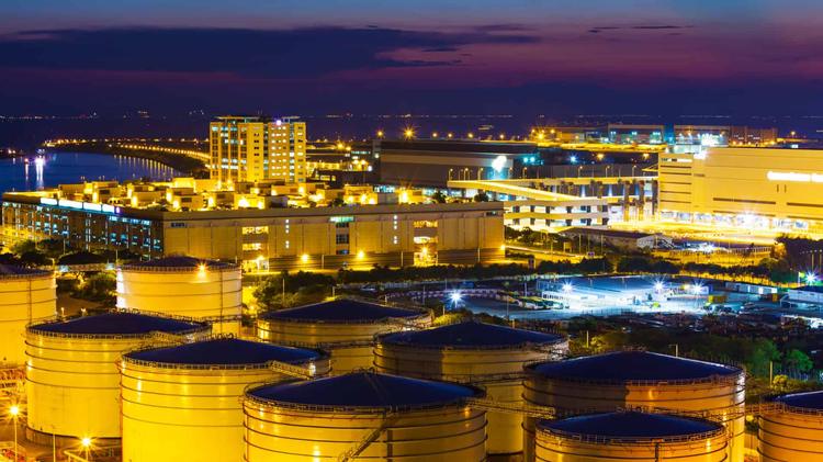 opec oil tanks sunset
