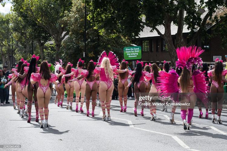 Samba dancers in colorful costumes perform during the Monday Parade of the Notting Hill Carnival 2026 in London, United Kingdom, on August 31, 2026. 