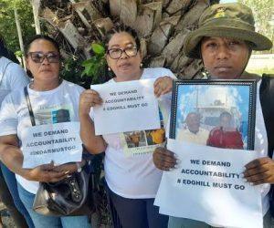 Relatives of MV Barima staffers, Neil and Kevin Cort, protests outside the office of the Guyana President on August 12, 2026.
