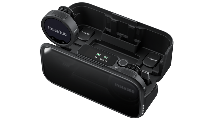 Two Insta360 Mic Pro transmitters and a reciever in its charging case.