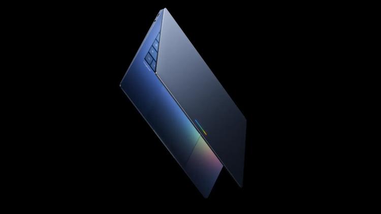 Googlebook laptop in front of black background