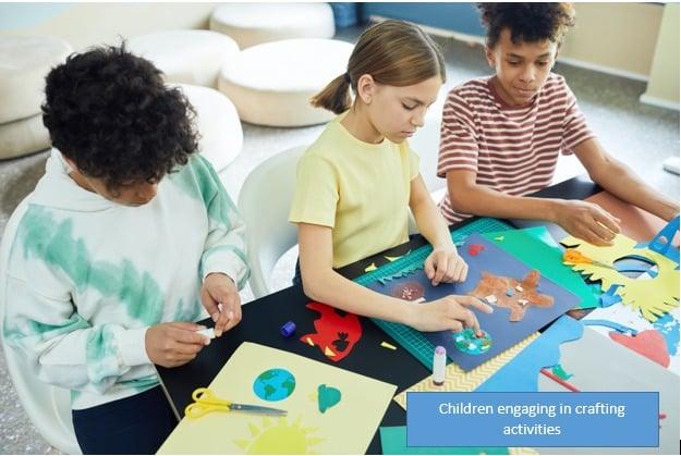 Children engaging in crafting activities