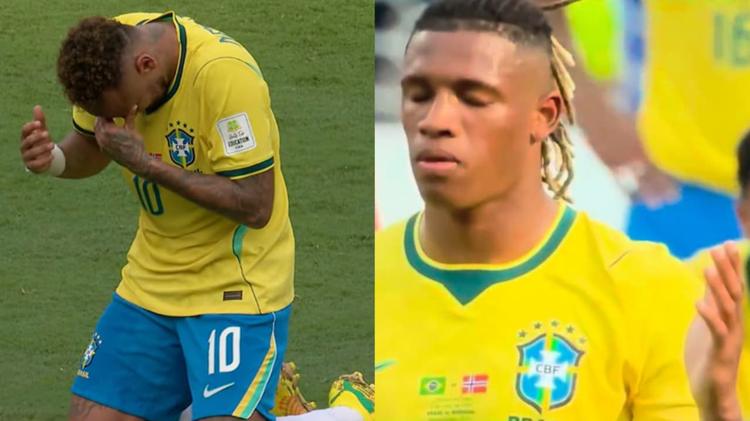 Neymar e Danilo Santos oram em campo após eliminação do Brasil na Copa