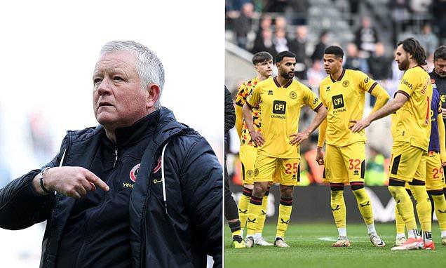 Chris Wilder blasts his Sheffield United flops for 'raising
the white flag' in too many games as 5-1 thrashing at Newcastle
confirmed their relegation... but he's determined to lead his
hometown club back up