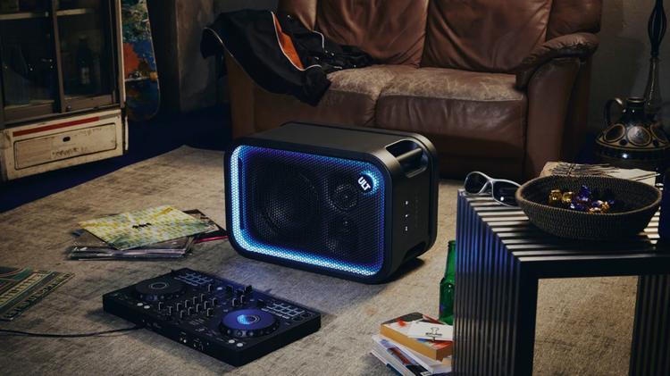 Sony ULT Tower 5 on the floor next to DJ equipment
