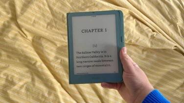 A Kindle Paperwhite Signature Edition with page turn cover