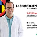 Smiling doctor in a white coat and teal shirt stands against a colorful abstract background, promoting a Milan medical conference banner.