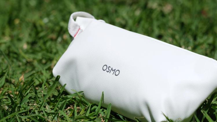 The DJI Osmo Pocket 4P's soft protective bag in white.
