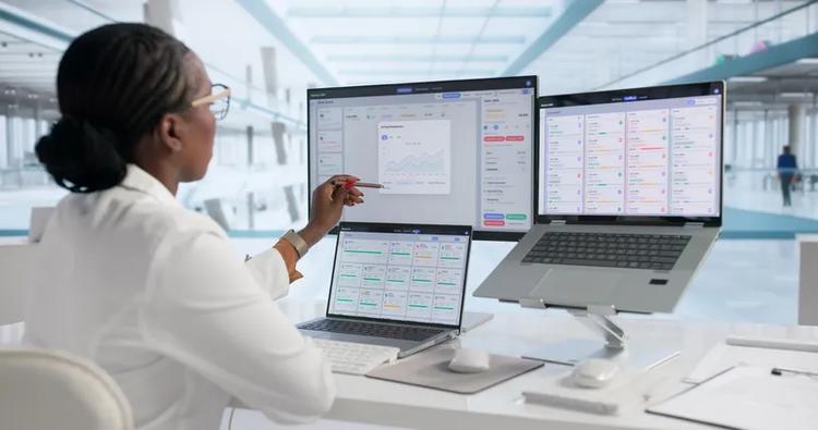 Healthcare Manager Uses Laptop