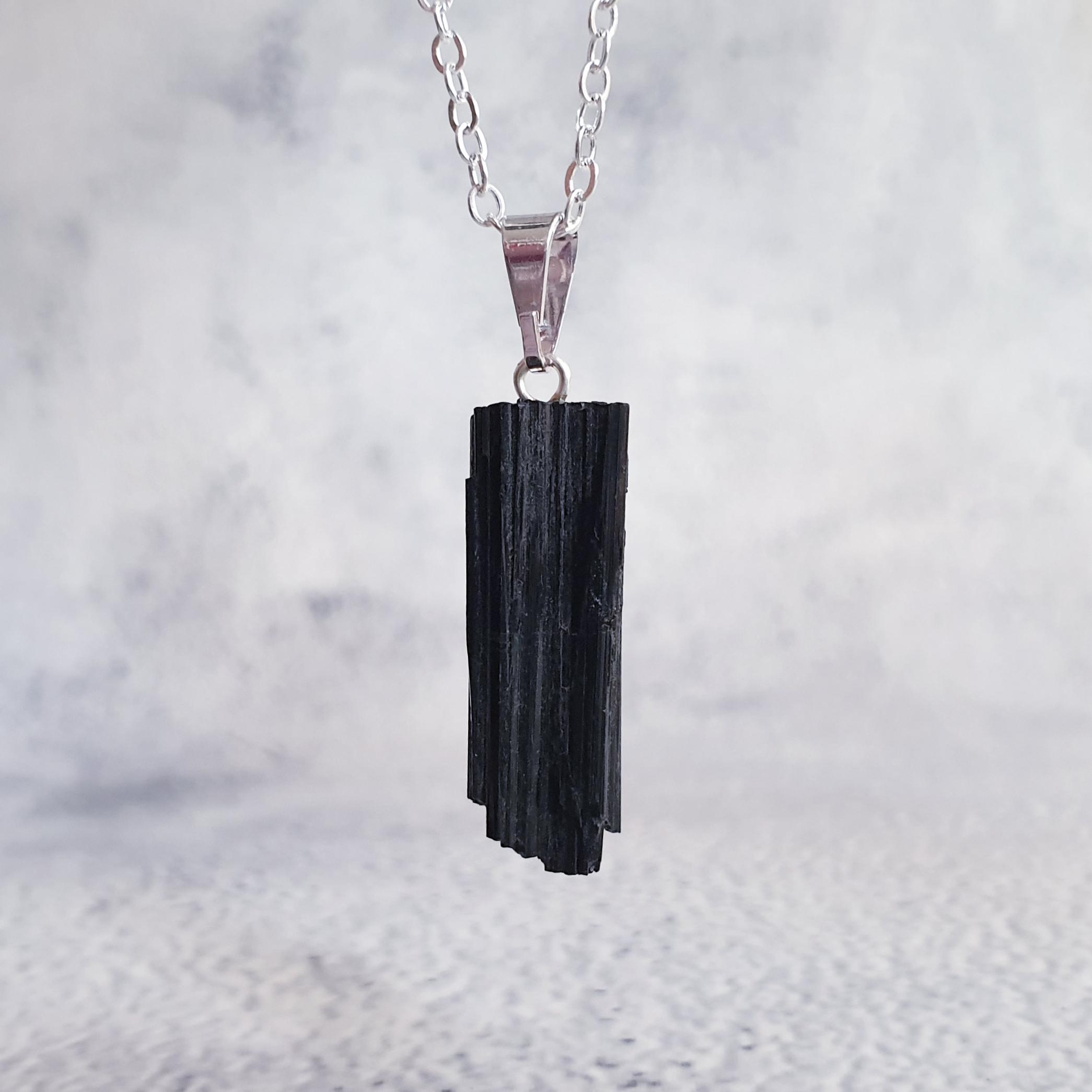 Black tourmaline crystal to help release self-imposed limitations at the Capricorn full moon