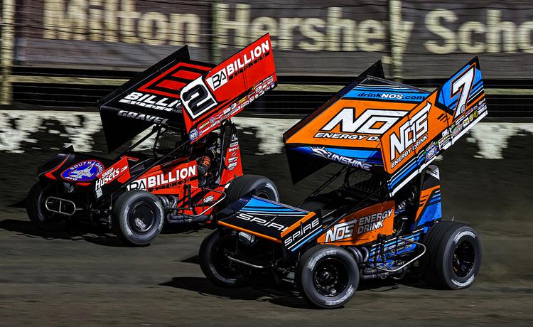 Tyler Courtney racing next to David Gravel