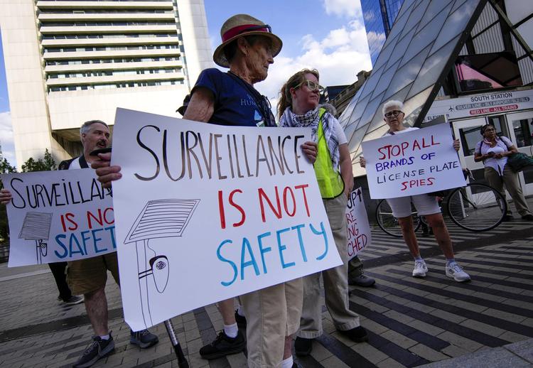 The Muslim Justice League and other activists hold a protest in which they marched to Flock Safety offices in the Seaport on August 19, 2026